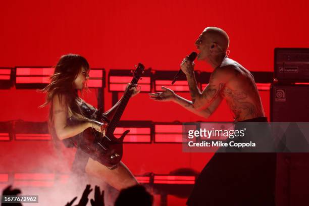Victoria De Angelis and Damiano David of Maneskin perform onstage during the 2023 MTV Video Music Awards at Prudential Center on September 12, 2023...