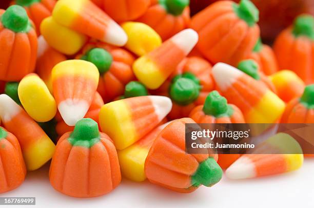 halloween candies - candy corn stock pictures, royalty-free photos & images