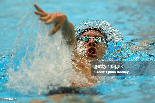 Mitch Larkin of Australia competes in the Men's 200 Metre Backstroke during day five of the Australian Swimming Championships at SA Aquatic and...