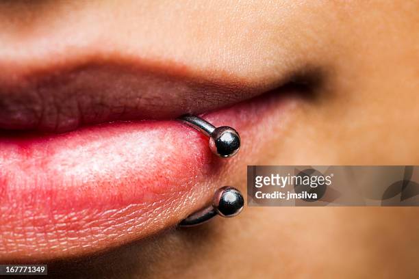 pier - body piercings stock pictures, royalty-free photos & images