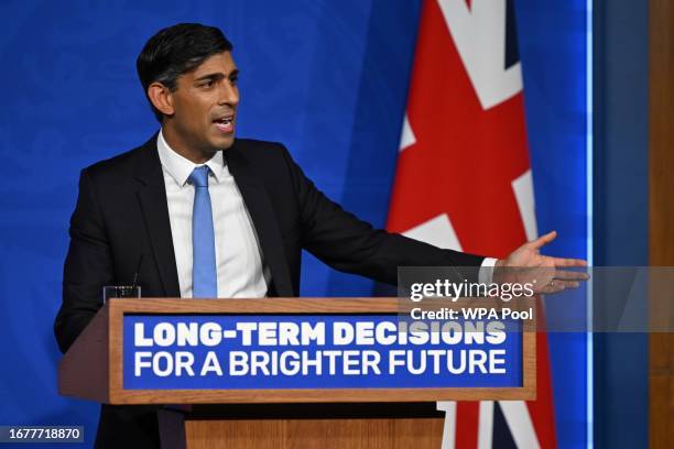 Prime Minister Rishi Sunak talks while a holding press conference on net zero policy change at Downing Street on September 20, 2023 in London,...