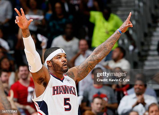 Josh Smith of the Atlanta Hawks reacts to the fans in the final minutes of their 102-91 win over the Indiana Pacers during Game Four of the Eastern...
