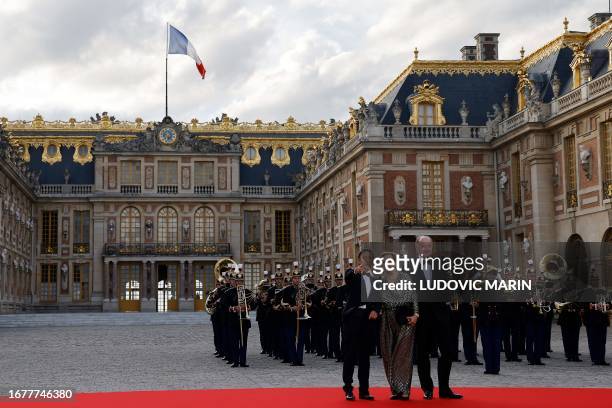 French-Luxembourger television and radio host Stephane Bern , Yves de Gaulle , grand-son of Charles de Gaulle, and his partner Laurence arrive to...