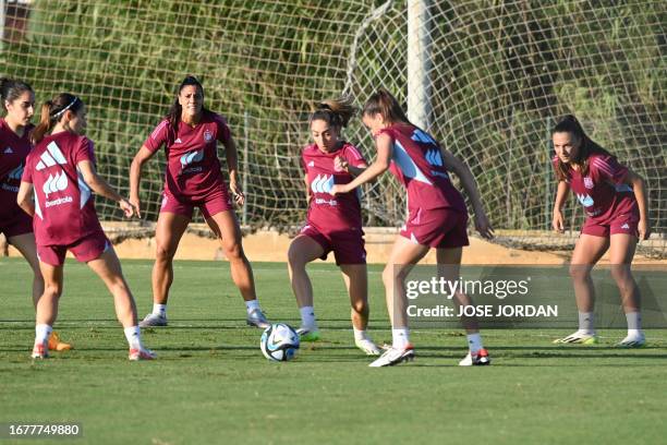 Spain's Olga Carmona and teammates attend a training session in Oliva near Valencia, on September 20, 2023 ahead of their UEFA Nations League...