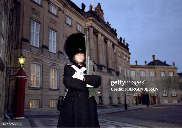 Picture dated 15 November 1999 of the only female member of the Danish Royal Guard on duty at the Queen's residence Amalienborg Castle in Copenhagen....