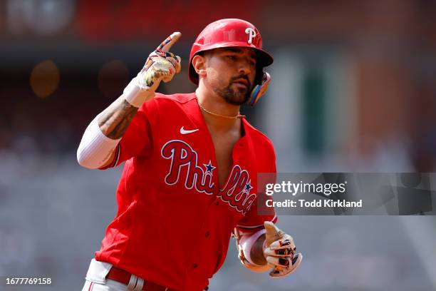 Nick Castellanos of the Philadelphia Phillies rounds third after hitting a solo home run during the second inning against the Atlanta Braves at...