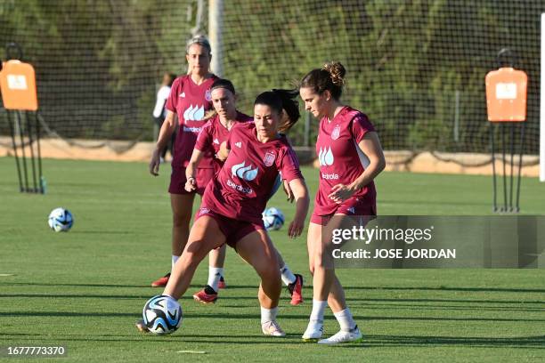 Spain's team players attend a training in Oliva near Valencia, on September 20, 2023 ahead of their UEFA Nations League football matches against...