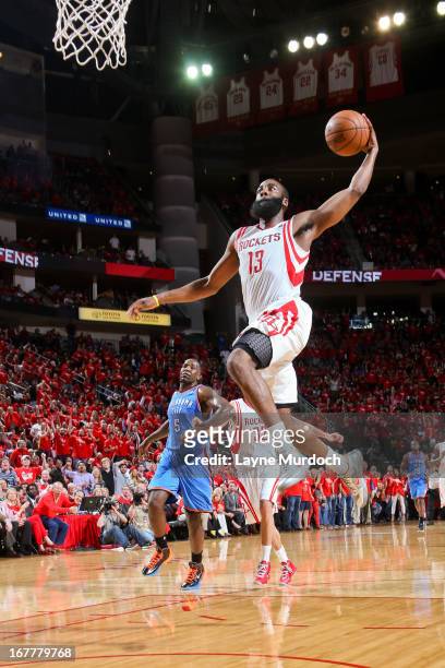 James Harden of the Houston Rockets dunks on a fast break against the Oklahoma City Thunder in Game Four of the Western Conference Quarterfinals...