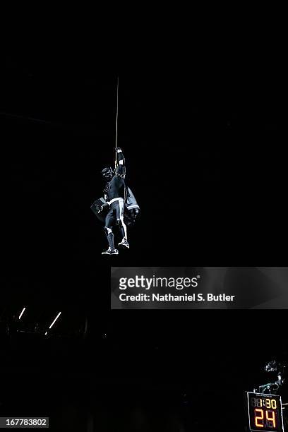 The Brooklyn Knight of the Brooklyn Nets comes from the rafters prior to the game against the Chicago Bulls in Game Five of the Eastern Conference...