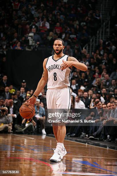 Deron Williams of the Brooklyn Nets dribbles the ball against the Chicago Bulls in Game Five of the Eastern Conference Quarterfinals during the 2013...