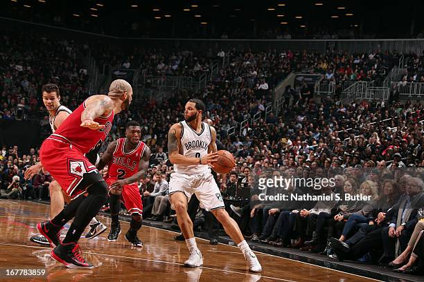 Deron Williams of the Brooklyn Nets passes the ball against the Chicago Bulls in Game Five of the Eastern Conference Quarterfinals during the 2013...