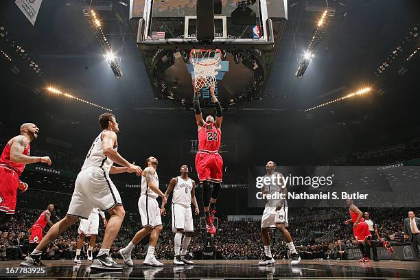 Taj Gibson of the Chicago Bulls goes up for layup against the Brooklyn Nets in Game Five of the Eastern Conference Quarterfinals during the 2013 NBA...