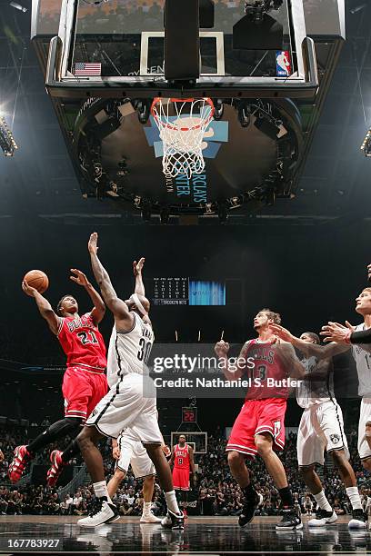 Jimmy Butler of the Chicago Bulls puts up a shot against the Brooklyn Nets in Game Five of the Eastern Conference Quarterfinals during the 2013 NBA...
