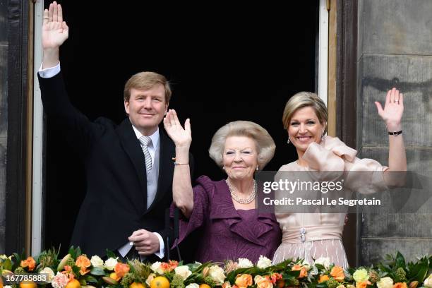 Princess Beatrix of the Netherlands with HM King Willem Alexander and HM Queen Maxima appear on the balcony of the Royal Palace to greet the public...