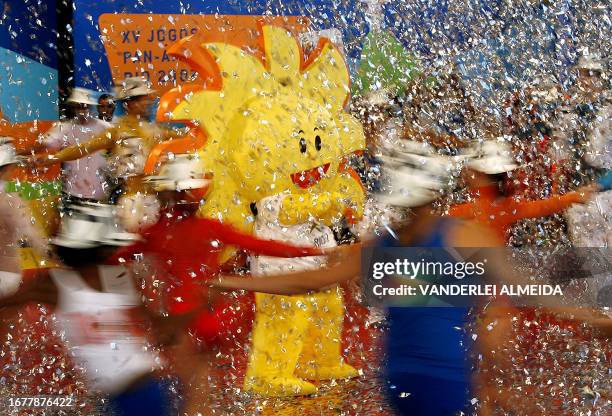 Dancers perform during the presentation to the press of O Sol , the new Pan-American 2007 Games mascot, in Rio de Janeiro 13 July 2006. O Sol was...