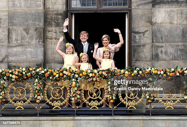 King Willem-Alexander of the Netherlands and HM Queen Maxima of the Netherlands appear on the balcony of the Royal Palace with their daughters...