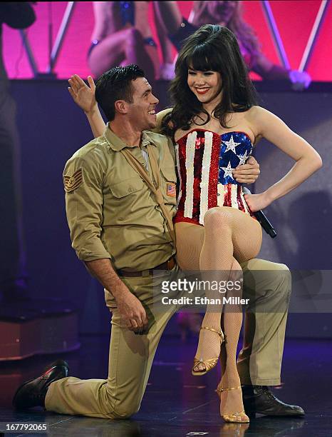 Dancer Ryan Kelsey and model Claire Sinclair perform during the premiere of the show "Pin Up" at the Stratosphere Casino Hotel on April 29, 2013 in...