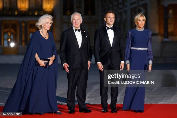 Britain's Queen Camilla, Britain's King Charles III, French President Emmanuel Macron and French president's wife Brigitte Macron arrive to attend a...