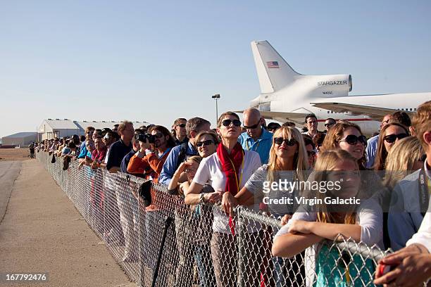 Friends and family watch as the aircraft climbs for the first powered flight of Virgin Galactic's SpaceShipTwo on April 29, 2013 in Mojave,...