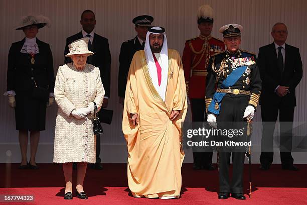 Queen Elizabeth II and Prince Philip, the Duke of Edinburgh pose with The President of the United Arab Emirates, His Highness Sheikh Khalifa bin...