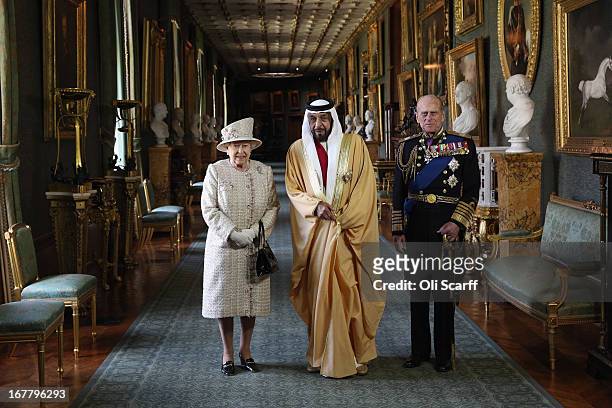 Queen Elizabeth II and Prince Philip, Duke of Edinburgh , greet The President of the United Arab Emirates, His Highness Sheikh Khalifa bin Zayed Al...