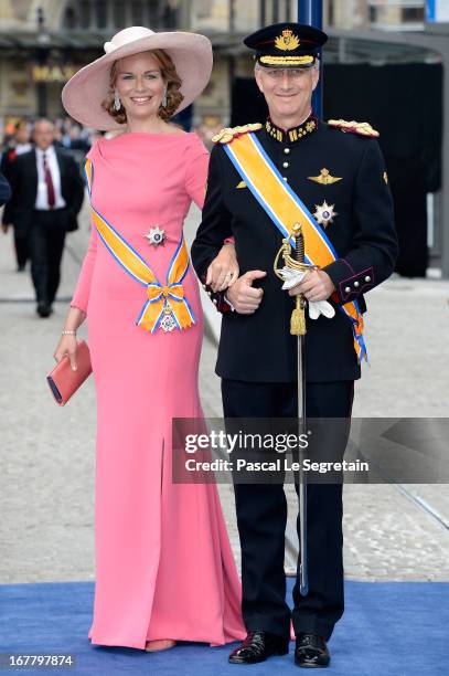 Princess Mathilde of Belgium and Prince Philippe of Belgium depart the Nieuwe Kerk to return to the Royal Palace after the abdication of Queen...