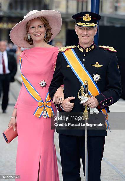 Princess Mathilde of Belgium and Prince Philippe of Belgium depart the Nieuwe Kerk to return to the Royal Palace after the abdication of Queen...