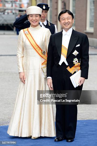 Crown Prince Naruhito and Crown Princess Masako of Japan depart the Nieuwe Kerk to return to the Royal Palace after the abdication of Queen Beatrix...