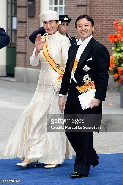 Crown Prince Naruhito and Crown Princess Masako of Japan depart the Nieuwe Kerk to return to the Royal Palace after the abdication of Queen Beatrix...
