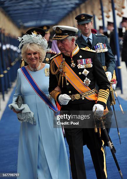 Prince Charles, Prince of Wales and Camilla, Duchess of Cornwall leave following the inauguration ceremony for HM King Willem Alexander of the...