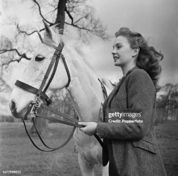 English actress Jean Simmons with her pony out riding in Harrow, north west London in March 1946. Jean Simmons has just been cast as Estella in the...