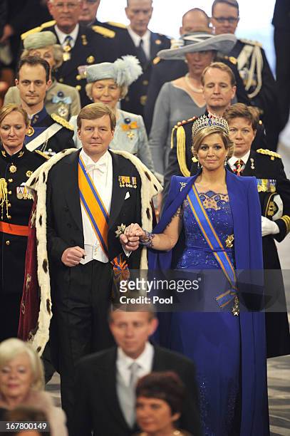 King Willem-Alexander of the Netherlands and HM Queen Maxima of the Netherlands attend their inauguration ceremony at New Church on April 30, 2013 in...