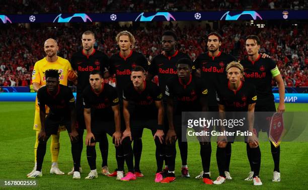 Salzburg players pose for a team photo before the start of the Group D - UEFA Champions League 2023/24 match between SL Benfica and FC Salzburg at...