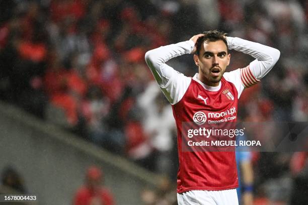 Sporting Braga's Portuguese midfielder Ricardo Horta reacts during the UEFA Champions League 1st round day 1 group C football match between SC Braga...