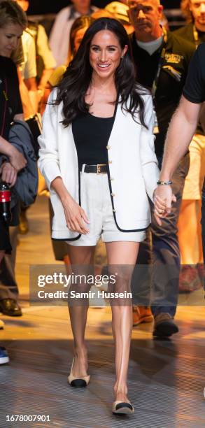 Meghan, Duchess of Sussex attends the Wheelchair Basketball preliminary match between Ukraine and Australia during day four of the Invictus Games...
