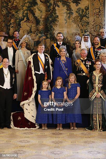 King Willem Alexander and Queen Maxima of the Netherlands pose with guests following their inauguration ceremony, at the Royal Palace on April 30,...