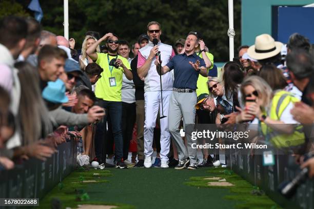 Anton du Beke participates in the Long Putt challenge alongside Dan Walker, in the Championship Village ahead of the Pro-Am prior to the BMW PGA...