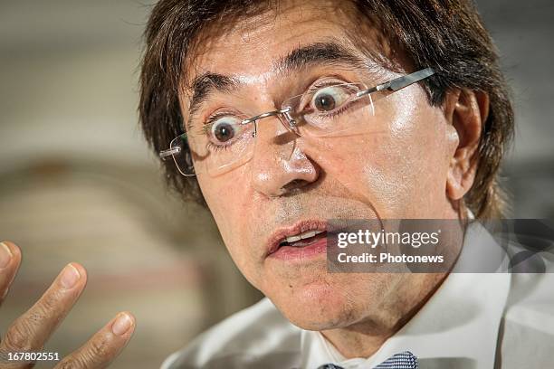 Belgian Prime Minster Elio Di Rupo poses during an interview on April 23, 2013 in Brussels, Belgium.