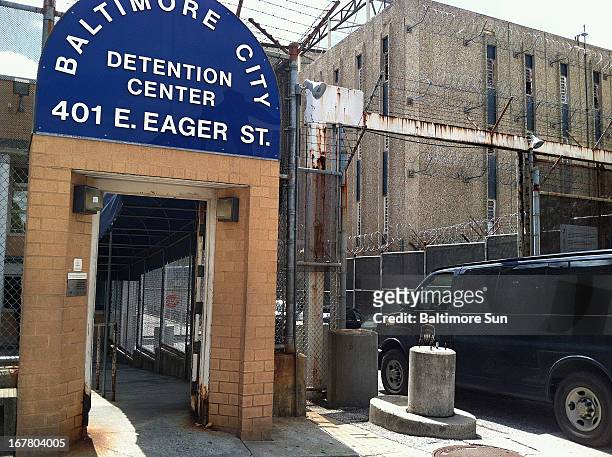 Prison van drives past the entrance to the Baltimore City Detention Center on E. Eager Street where criminal activity took place, April 23, 2013. An...
