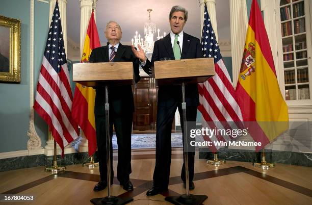 Secretary of State John Kerry appears with Foreign Minister of Spain Jose Manuel Garcia-Margallo during a press conference at the State Department...