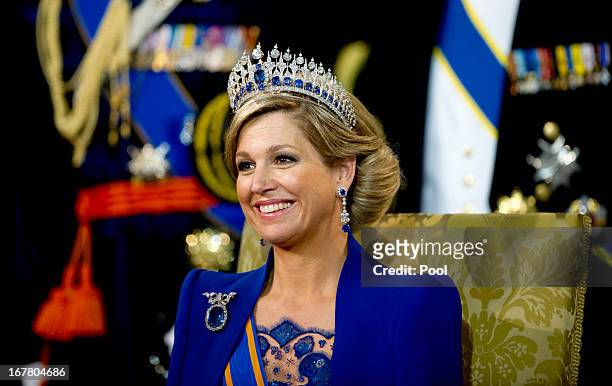 Queen Maxima of the Netherlands looks on during the inauguration ceremony at New Church on April 30, 2013 in Amsterdam, Netherlands.