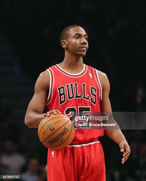 Marquis Teague of the Chicago Bulls dribbles the ball against the Brooklyn Nets during Game Five of the Eastern Conference Quarterfinals of the 2013...