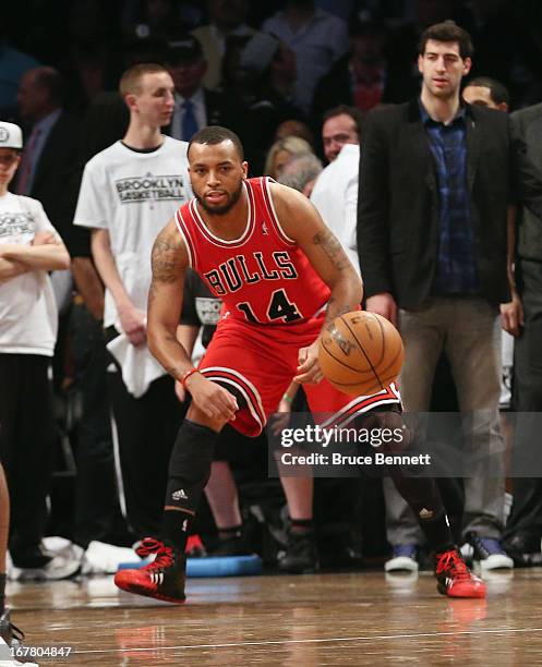 Daequan Cook of the Chicago Bulls dribbles the ball against the Brooklyn Nets during Game Five of the Eastern Conference Quarterfinals of the 2013...