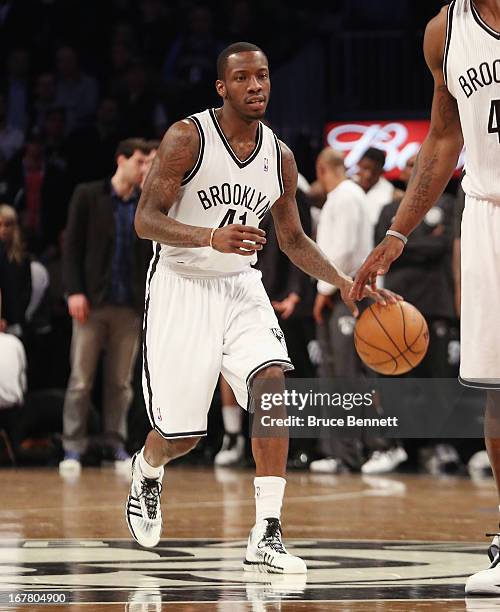 Tyshawn Taylor of the Brooklyn Nets dribbles the ball against the Chicago Bulls during Game Five of the Eastern Conference Quarterfinals of the 2013...