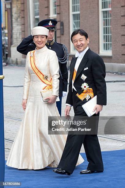 Crown Prince Naruhito, and Crown Princess Masako of Japan leave the Nieuwe Kerk in Amsterdam after the inauguration ceremony of King Willem Alexander...