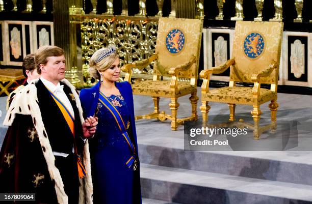 King Willem Alexander of the Netherlands and HM Queen Maxima of the Netherlands during their inauguration ceremony at New Church on April 30, 2013 in...