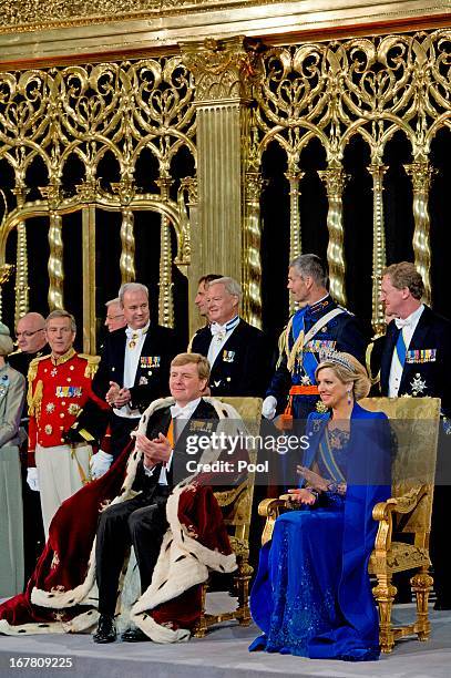 King Willem Alexander of the Netherlands and HM Queen Maxima of the Netherlands during their inauguration ceremony at New Church on April 30, 2013 in...