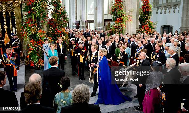 King Willem Alexander of the Netherlands and HM Queen Maxima of the Netherlands during their inauguration ceremony at New Church on April 30, 2013 in...
