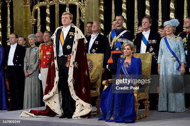 King Willem Alexander of the Netherlands and HM Queen Maxima of the Netherlands during their inauguration ceremony at New Church on April 30, 2013 in...