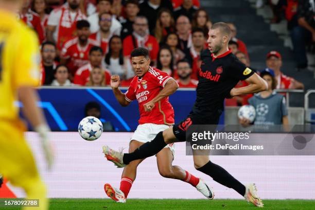 Alexander Bah of SL Benfica, Strahinja Pavlovic of FC Salzburg battle for the ball during the UEFA Champions League match between SL Benfica and FC...